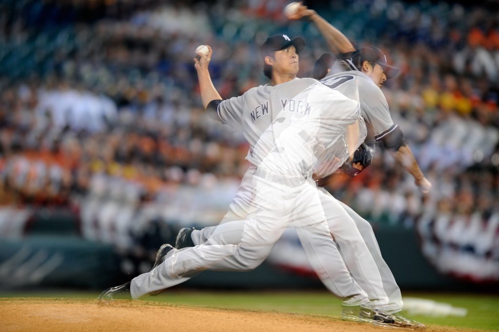 2009年4月8日，紐約洋基隊的王建民在巴爾的摩金鶯隊的主場上場投球。（攝影／Getty Images／G Fiume）